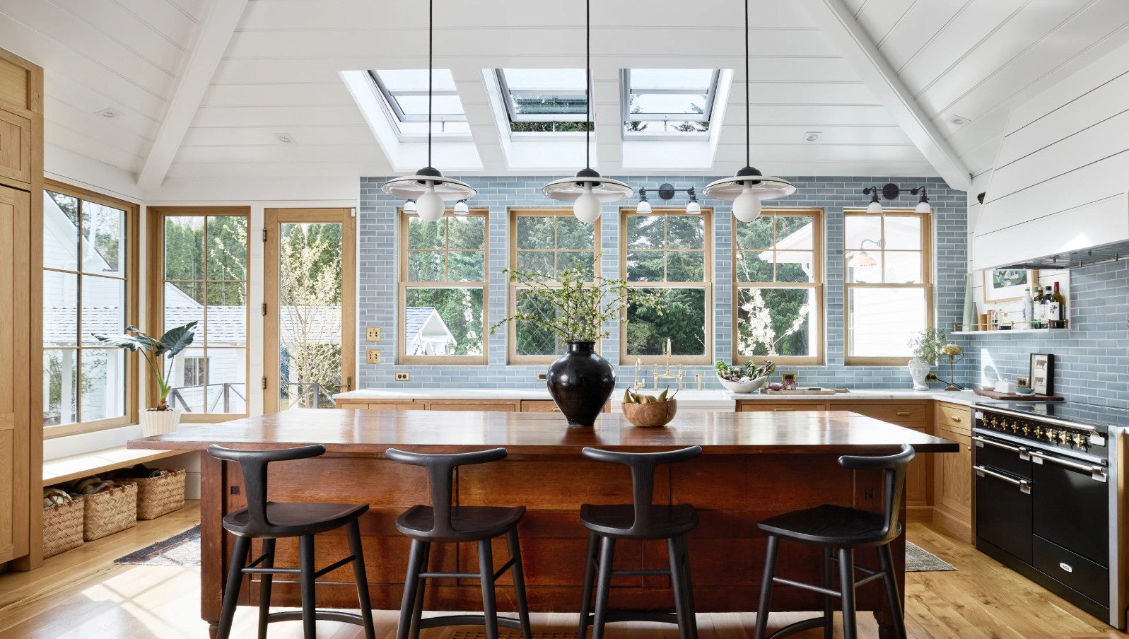 Man Using Measuring Tape in Factory Setting Man Using Measuring Tape in Factory Setting