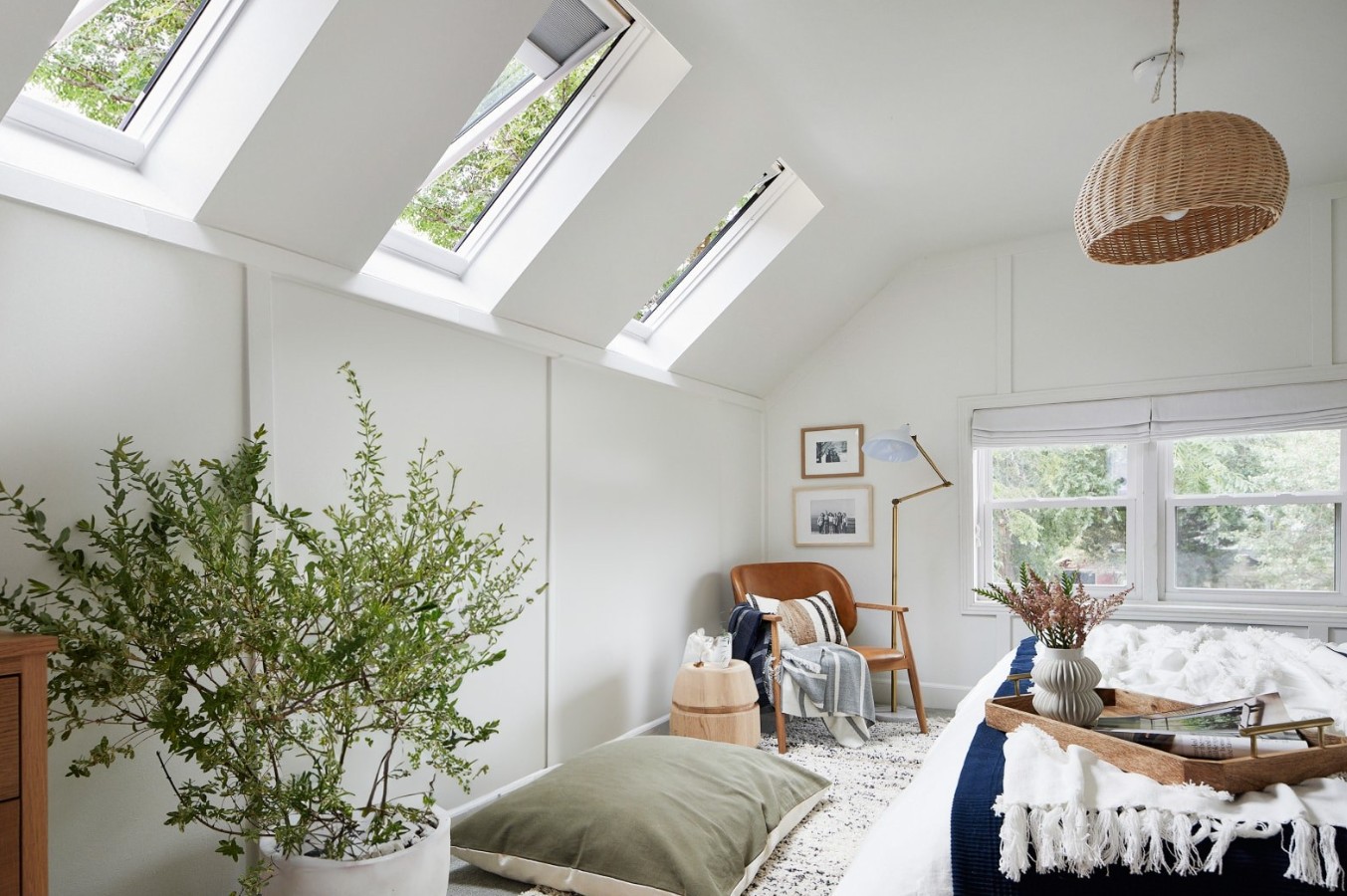 Man Using Measuring Tape in Factory Setting Man Using Measuring Tape in Factory Setting